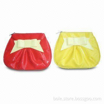 PVC Cosmetic Bags, Elegant with Pleat and Butterfly Decoration at Front